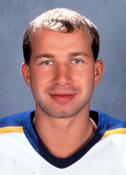 Alexei Zhitnik hockey player photo