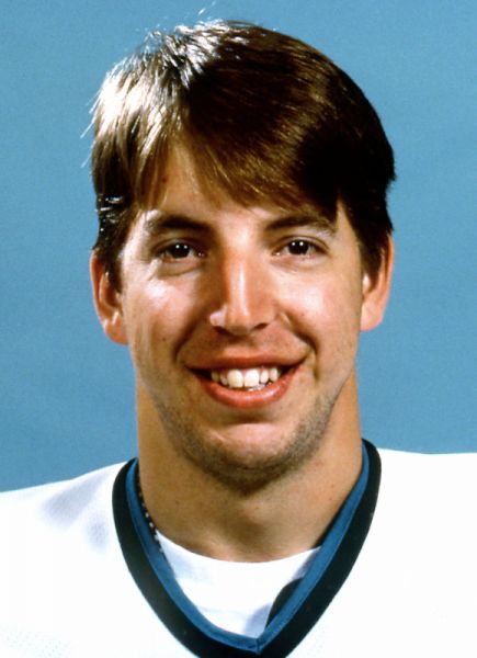 Mike Rathje hockey player photo