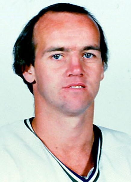Tom Rowe hockey player photo